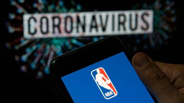 1639474887973081567.jpg https___specials-images.forbesimg.com_imageserve_61b7a5afbb8d677766ff75e8_In-this-photo-illustration-the-American-National-Basketball---_960x0.jpg